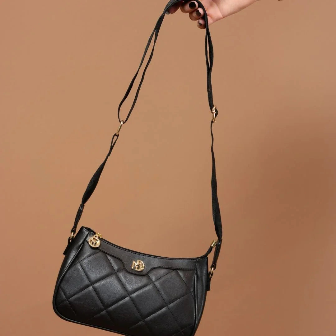 Bolsa de ombro feita em couro napa